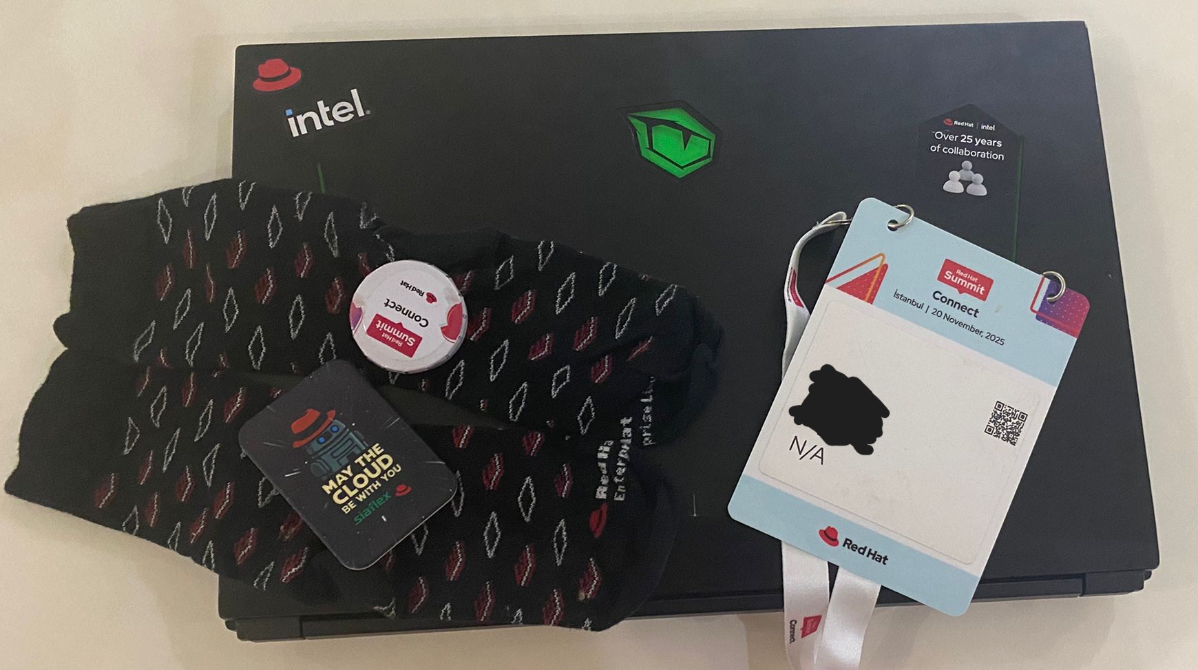 rhel socks, stickers, and the fridge magnet